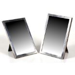 A rectangular silver framed strut mirror, London 1928; together with a silver photo frame with