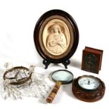 An oak mounted aneroid barometer; together with a brass mounted trinket box, a brass magnifying