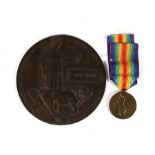 A WW1 Memorial Plaque named to John Owen with a WW1 Victory Medal named to 124168 Gunner W.H. Owen