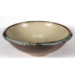 Leach Pottery St Ives - a stoneware bowl in the manner of Bernard Leach, decorated with three leaves