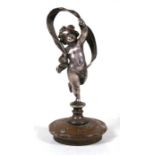 A silver plated car mascot radiator cap in the form of a dancing putti with flowing ribbon, 14cms (
