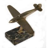 A WW2 plated Supermarine Spitfire mounted on a marble base. Wingspan of 16.5cms (6.5ins)