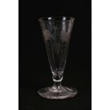 An 18th century etched ale glass decorated with hops and vines, 12.5cms (5ins) high.