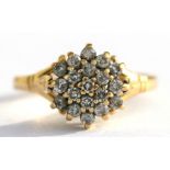 An 18ct gold & diamond cluster ring, approx UK size 'P'.