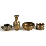 A polished bronze censer or bowl, 13cms (5ins) diameter; together with another bronze bowl, 9cms (