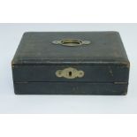 A Victorian black leather traveling stationary case, with fitted pen tray, twin inkwell section