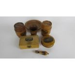 A collection of seven pieces of mauchline ware to include two money boxes, pin dish, pale,