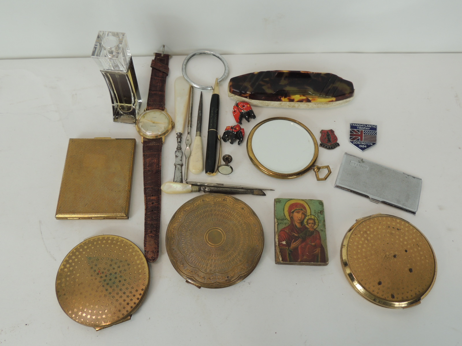 Mixed collectables including powder compacts, wristwatch, stamp case & others