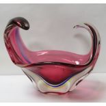 A large Murano pink glass vase having raised and tapered sides, 35cm wide