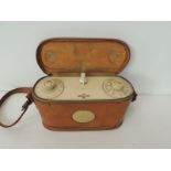 An early portable Roberts Radio having cream face & dials & in original brown leather case