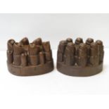 Two Victorian copper food moulds of traditional "castellated" form 11.5cm high