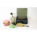 A circa 1940's moulded green glass perfume atomiser; another atomiser; a heavy metal box; powder