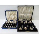 A cased set of 6 silver teaspoons together with another cased set of 6 silver teaspoons with