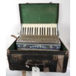 A Soprani piano accordian having blue marbled & floral decorated casing & in original carrying case