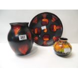 A Poole Pottery Lava pattern vase 21cm high; a Poole Lava pattern plate 27.5cm diameter & a