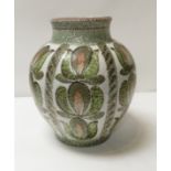 A Denby vase of ovoid form and painted with foliate design, 23cm high