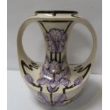 A Cobridge limited edition vase with purple iris decoration, signed to the base and numbered 24/