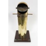 A submarine brass cased periscope mounted on wood base with engraved plaque "CM Hamma Cote Borg 1946