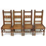 A set of four late 19th Century Irish pitch pine chairs, the tall railed backs with carved