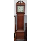 An oak long case clock, the corner of the face with sprays of flowers, by Selby