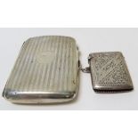 A silver cigarette case & a silver vesta with engraved decoration, total 3.6ozt