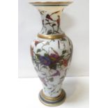 A tall 19th Century opaque glass baluster vase with painted morning glory decoration, 50cm high