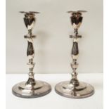 A pair of 18th Century Sheffield plate candlesticks of Neo Classical design, with detachable