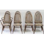 A set of 8 (6 + 2 carvers) Ercol stick back chairs