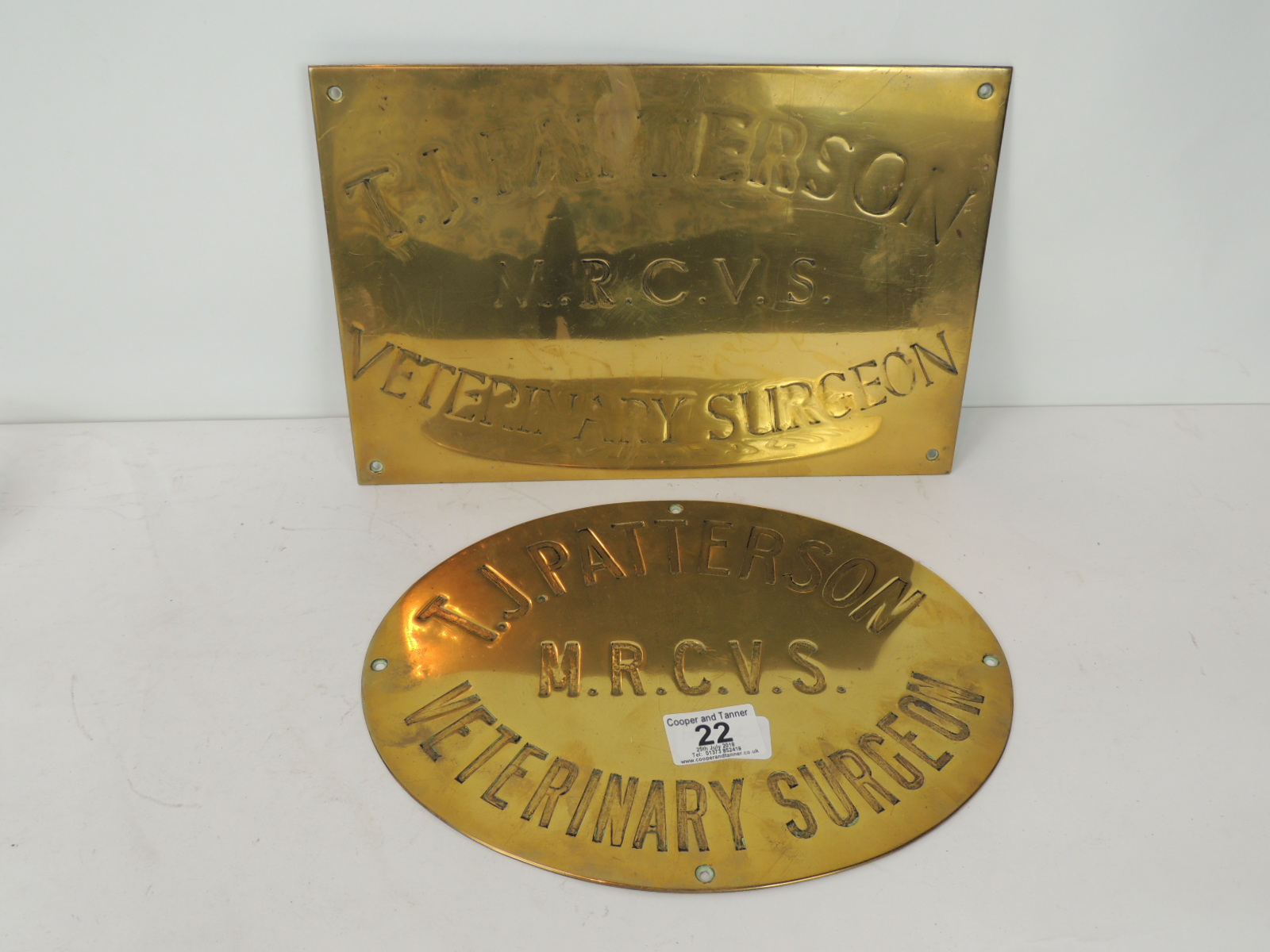 An engraved rectangular wall mounted name plate for "T J Patterson MRCVS Veterinary Surgeon" 20.5cm