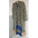 A circa 1920's ladies printed silk dress and long jacket, the dress with high neck, long sleeves &