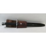 A modern military bayonet with moulded black grip & in black sheath, with leather frog stamped R