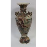 A Japanese Satsuma floor vase with applied kylin handles and with typical figural decoration, 96.5cm