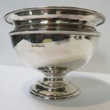 A circular silver pedestal bowl on stepped circular base, 19.5cm diameter, Sheffield 1909 (?), marks