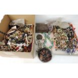 A large quantity of assorted costume jewellery including many different bead necklaces, paste set