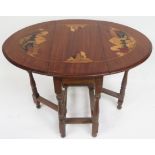 An early 20th Century mahogany gateleg table, the oval top with marquetry decoration of cottages and