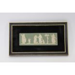 A framed Wedgwood green Jasperware plaque "Maternal Affection"