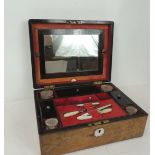 A Victorian rosewood ladies dressing case with fitted interior & lift-out tray, containing