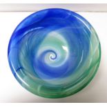 A large Kosta Boda glass bowl with swirl green/blue/white design, label to one side, 32cm diameter