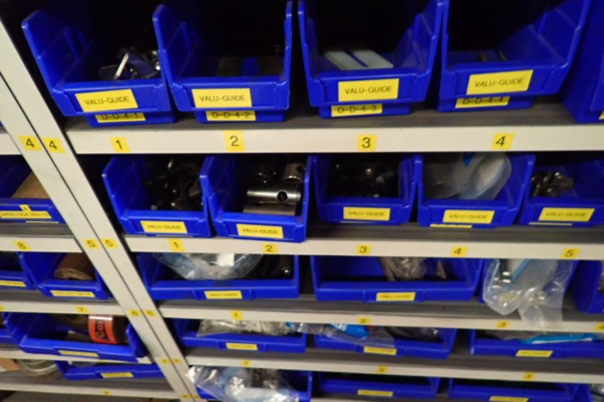 Contents only of 3 sections of shelving, conveyor parts, roller, clamps, springs, rod ends, hydrauli - Image 7 of 22