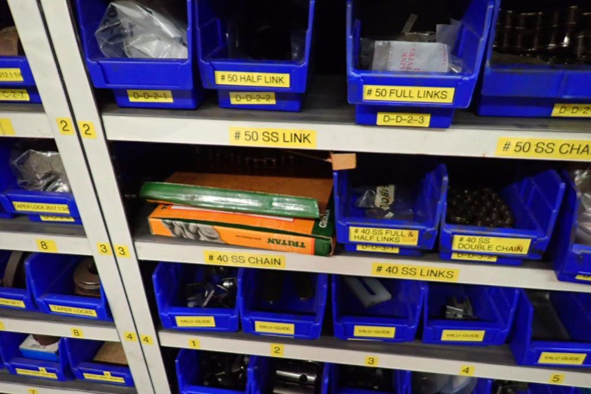 Contents only of 3 sections of shelving, conveyor parts, roller, clamps, springs, rod ends, hydrauli - Image 6 of 22