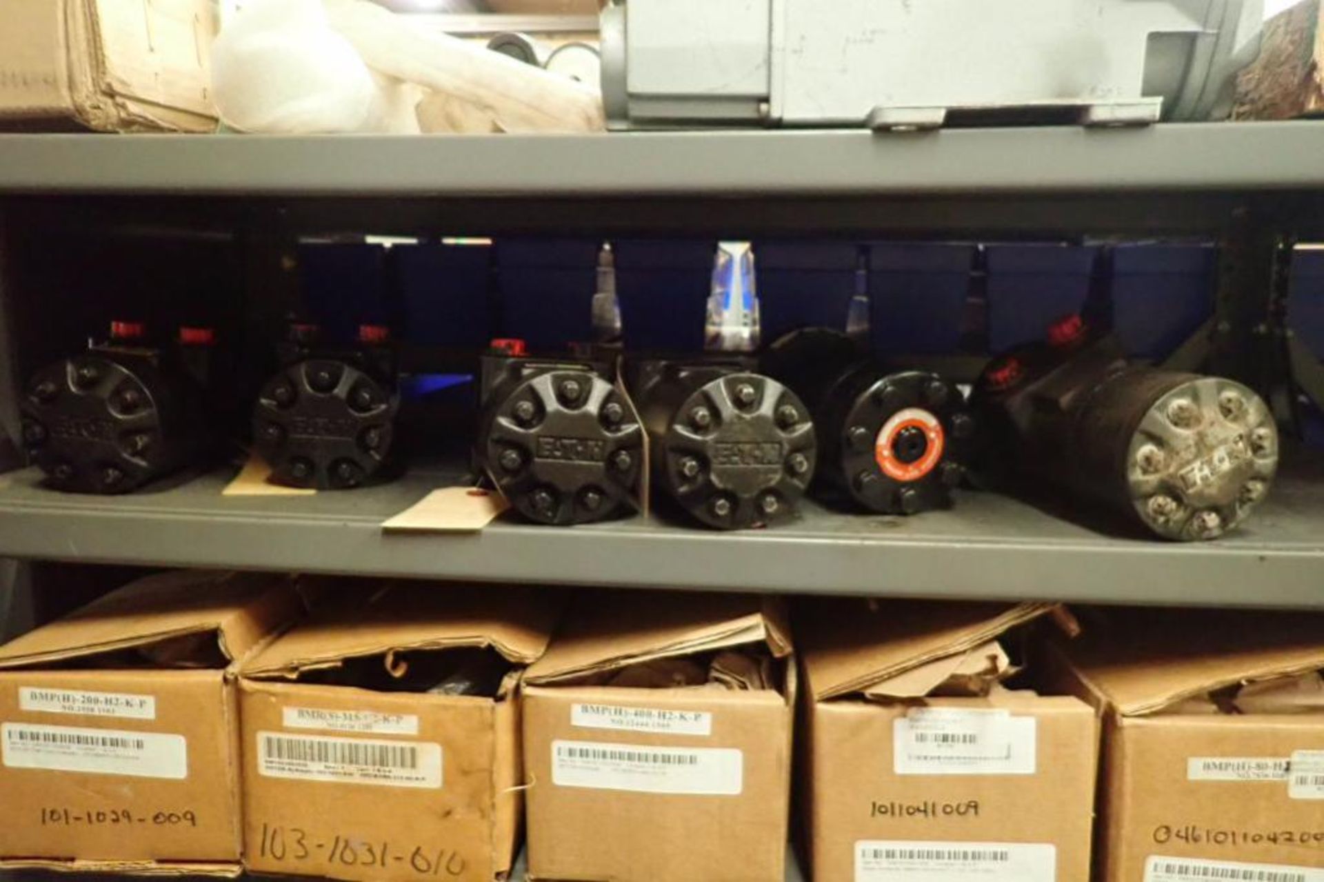 Contents only of 1 section of shelving, hydraulic motors, electric motors, water pipe flanges ** Rig - Image 5 of 45