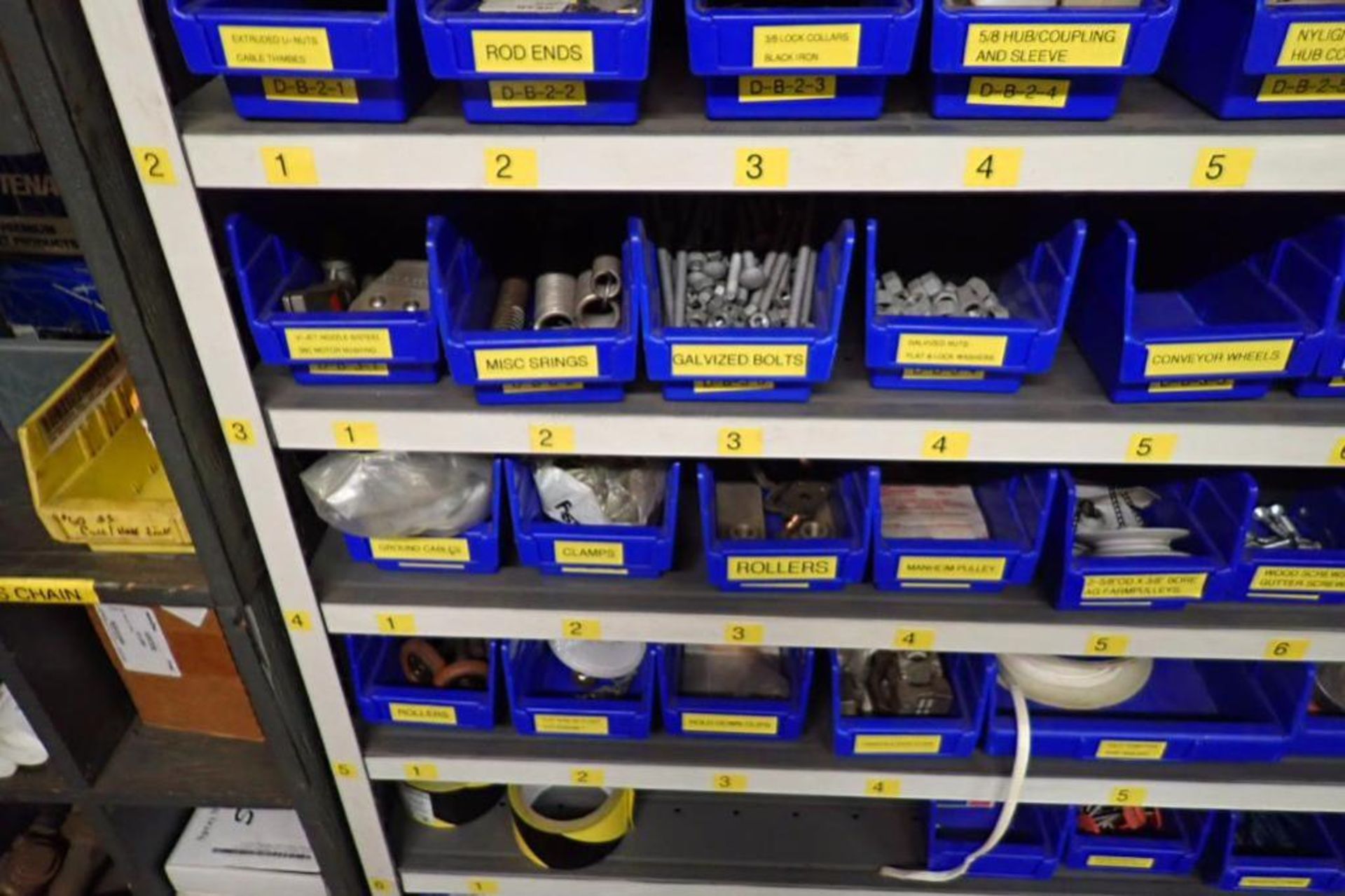 Contents only of 3 sections of shelving, conveyor parts, roller, clamps, springs, rod ends, hydrauli - Image 18 of 22