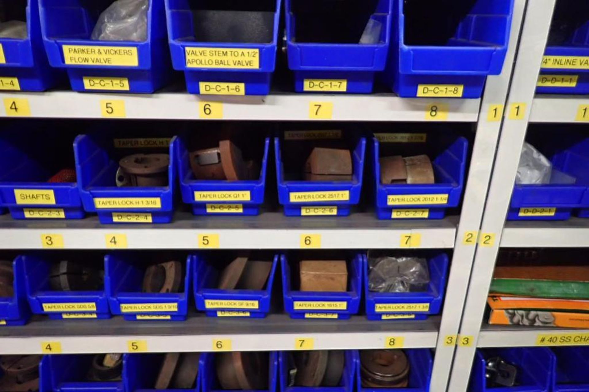 Contents only of 3 sections of shelving, conveyor parts, roller, clamps, springs, rod ends, hydrauli - Image 13 of 22