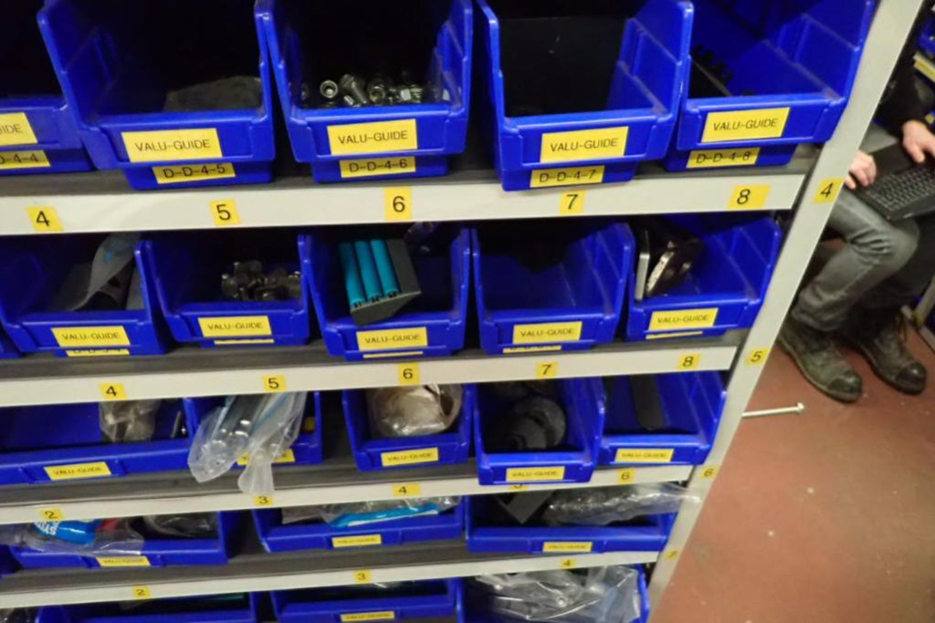 Contents only of 3 sections of shelving, conveyor parts, roller, clamps, springs, rod ends, hydrauli - Image 8 of 22