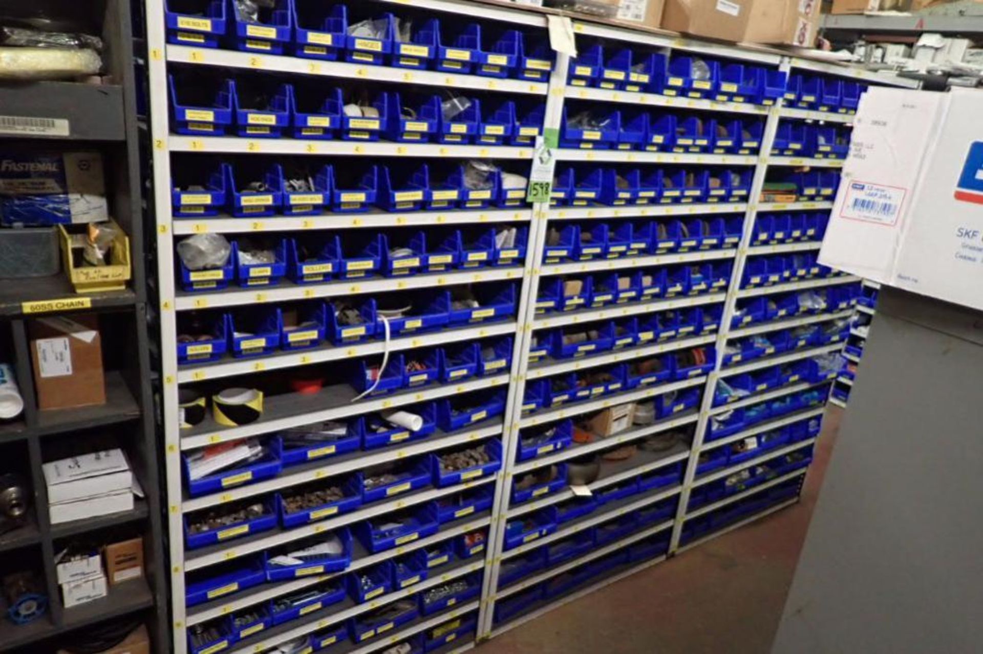 Contents only of 3 sections of shelving, conveyor parts, roller, clamps, springs, rod ends, hydrauli