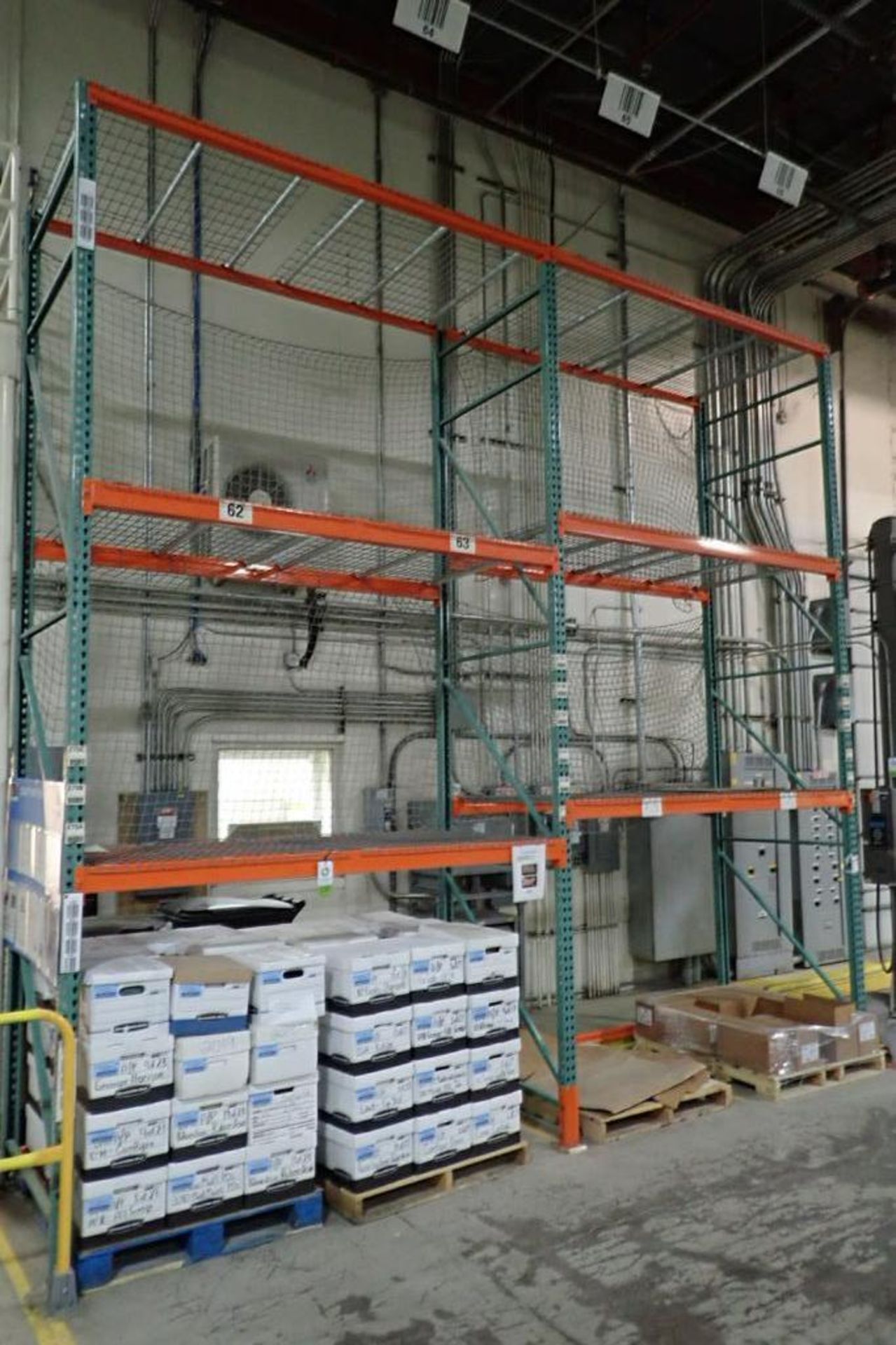 (2) sections of pallet racking, 96 in. long x 48 in. deep x 16 ft. tall. **Rigging Fee: $200** (Loca