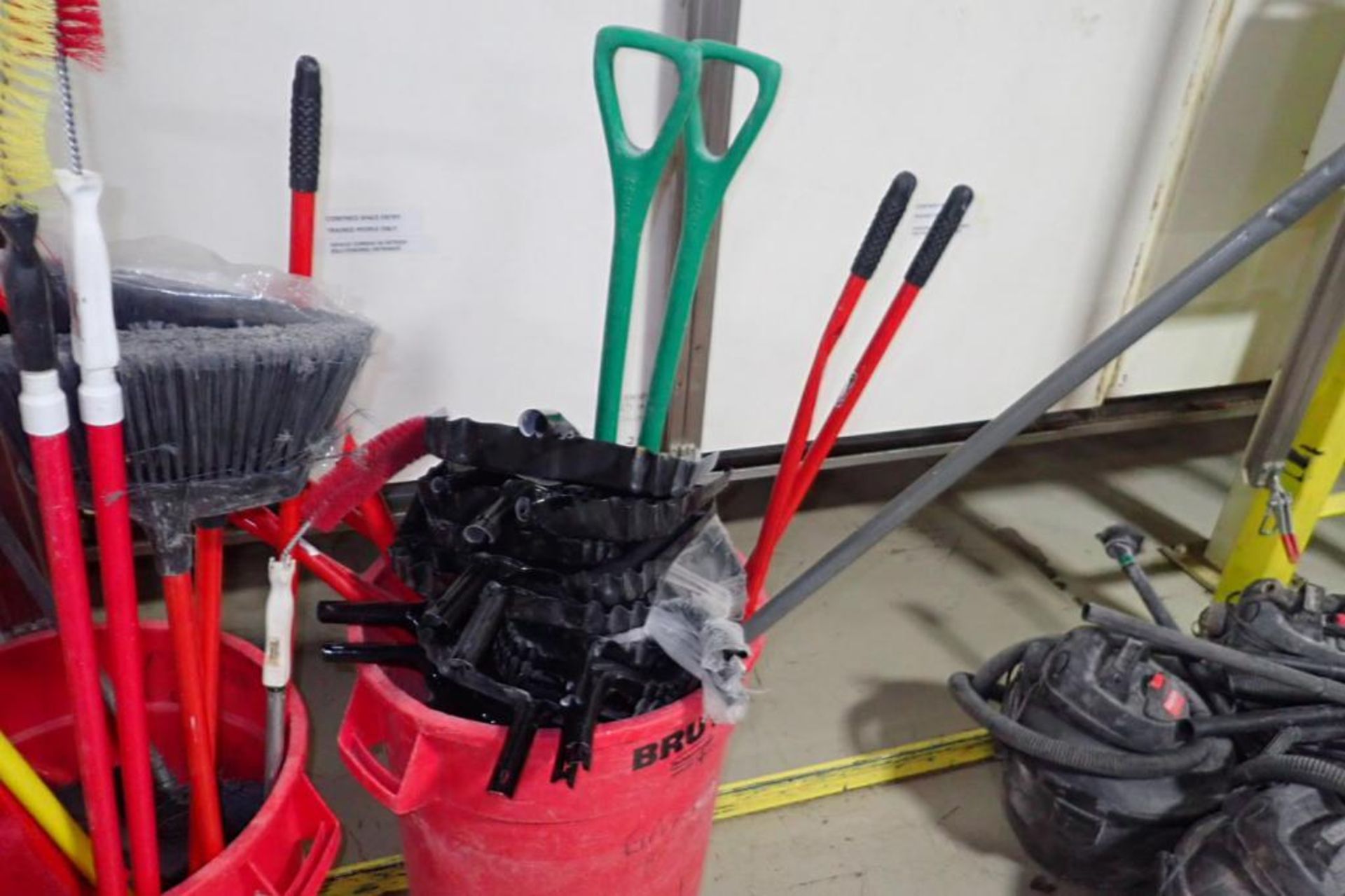 Assorted sanitation equipment, brooms, shovels, dust pans, mops. **Rigging Fee: $50** (Located in Br - Image 3 of 4