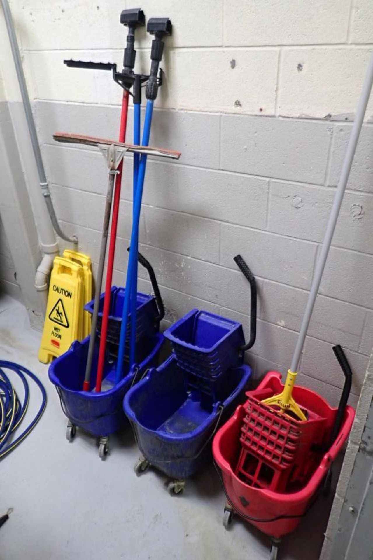 Contents of cleaning room, floor fan, wall fan, mop buckets. **Rigging Fee: $150** (Located in Brook - Image 2 of 3