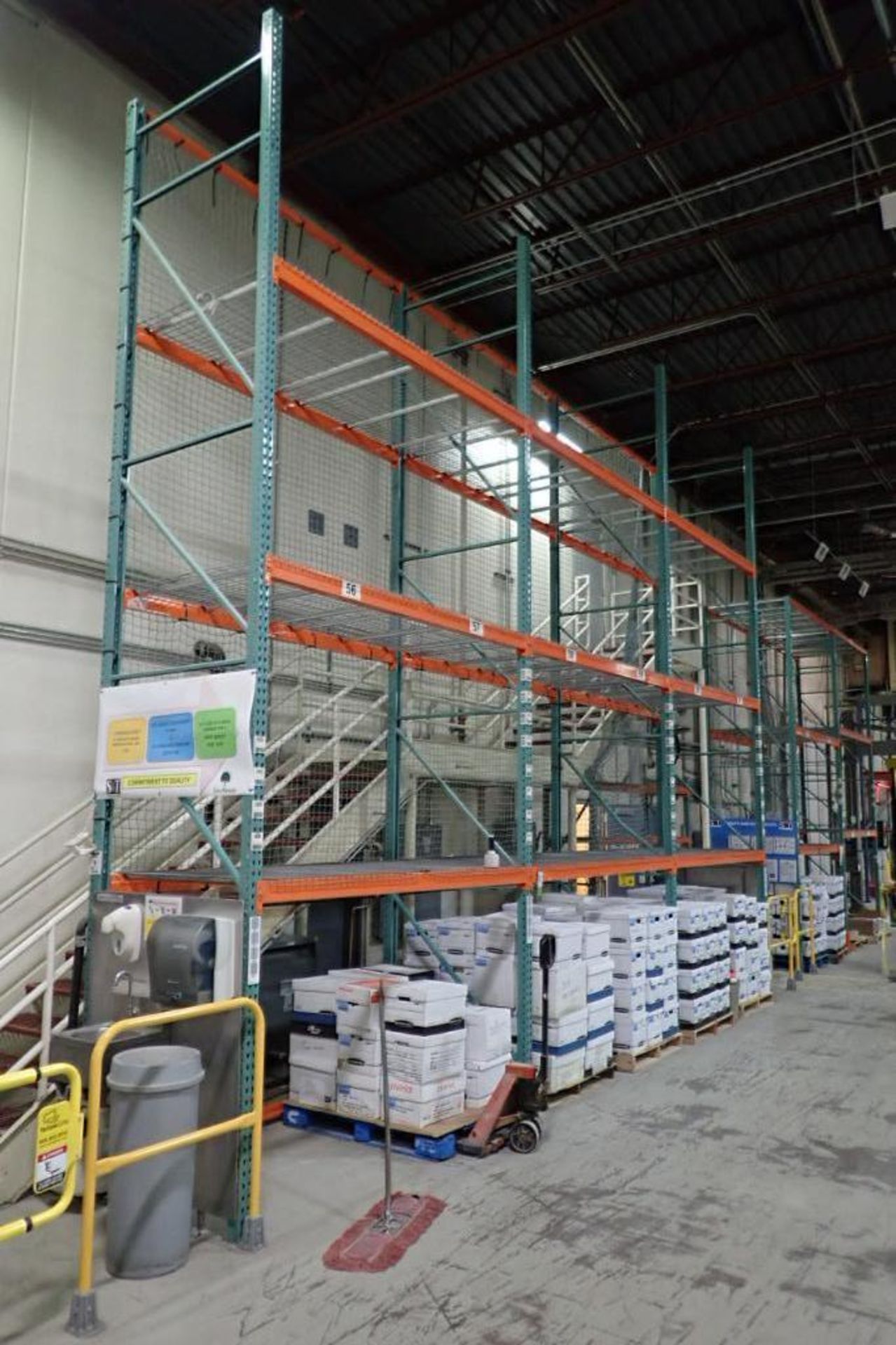 (3) sections of pallet racking, 96 in. long x 48 in. deep x 20 ft. tall. **Rigging Fee: $300** (Loca