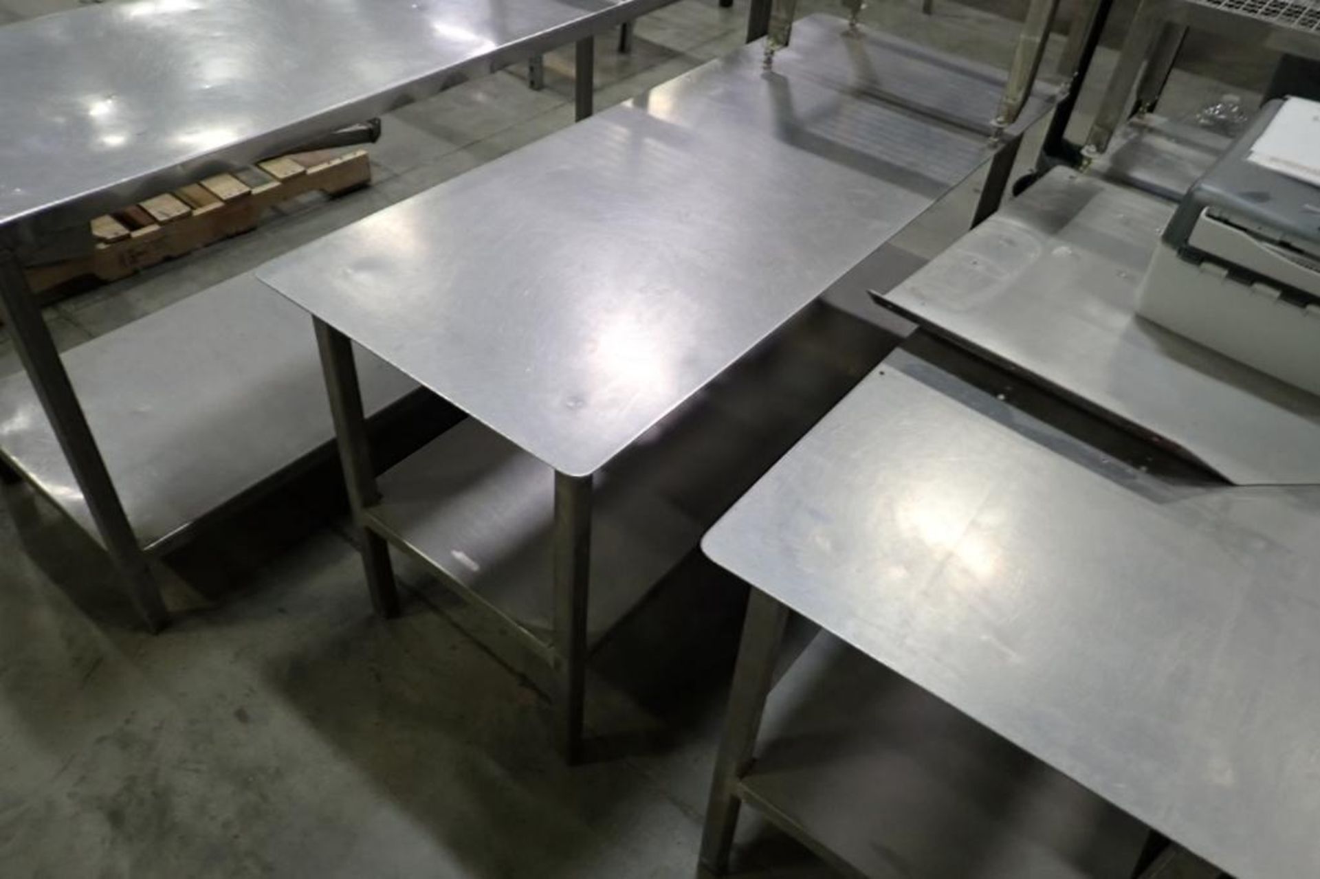 (4) SS assorted tables and (2) pedestal stands. **Rigging Fee: $100** (Located in Brooklyn Park, MN. - Image 4 of 7